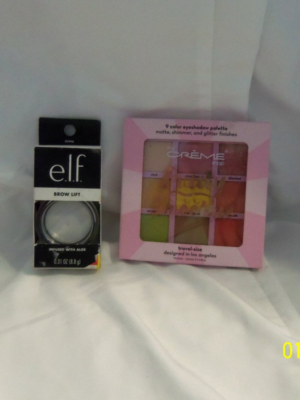 The Crem Eye shadow palette Travel size and Elf Brow Lift clear